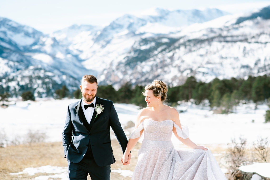 Colorado wedding seasons for winter wedding with snowy peaks in the background